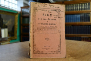 Sign e il suo distretto.