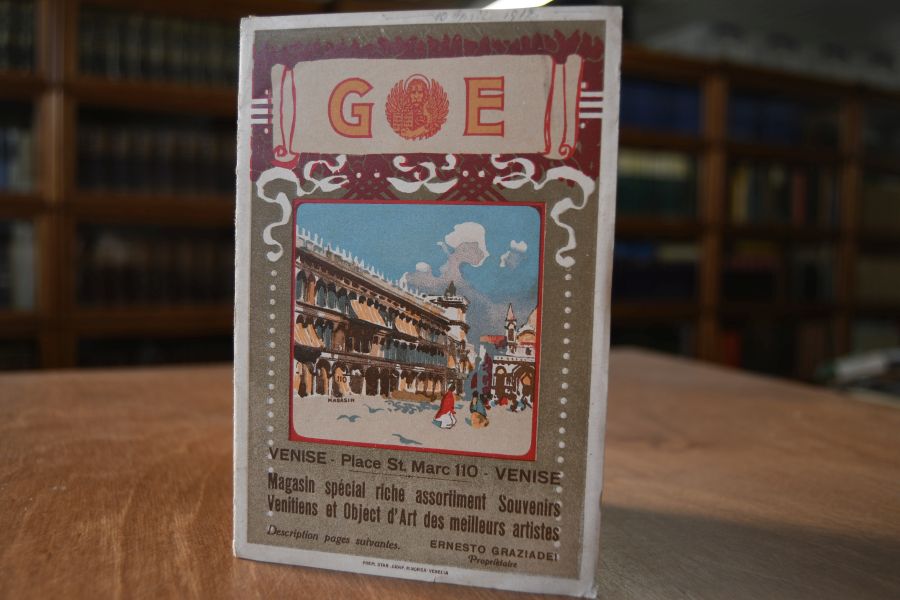 Ladenprospekt aus Venedig mit einem Stadtplan. GE Venise Place St. Marc 110. Magasin special riche assortiment Souvenirs Venitiens et Object d`Art des meilleurs artistes. Ernesto Graziadei